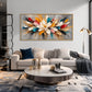 Prismatic Bloom artwork displayed above a pale sofa beside a floor lamp.
