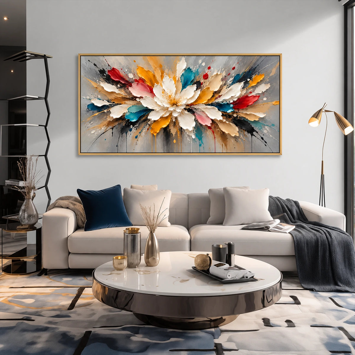 Prismatic Bloom artwork displayed above a pale sofa beside a floor lamp.