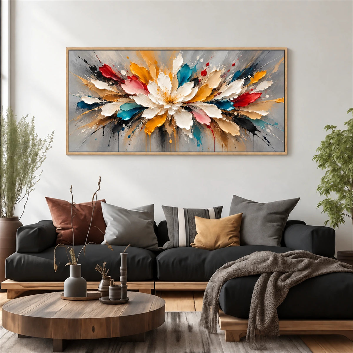 Prismatic Bloom artwork displayed above a dark sofa beside tall windows.