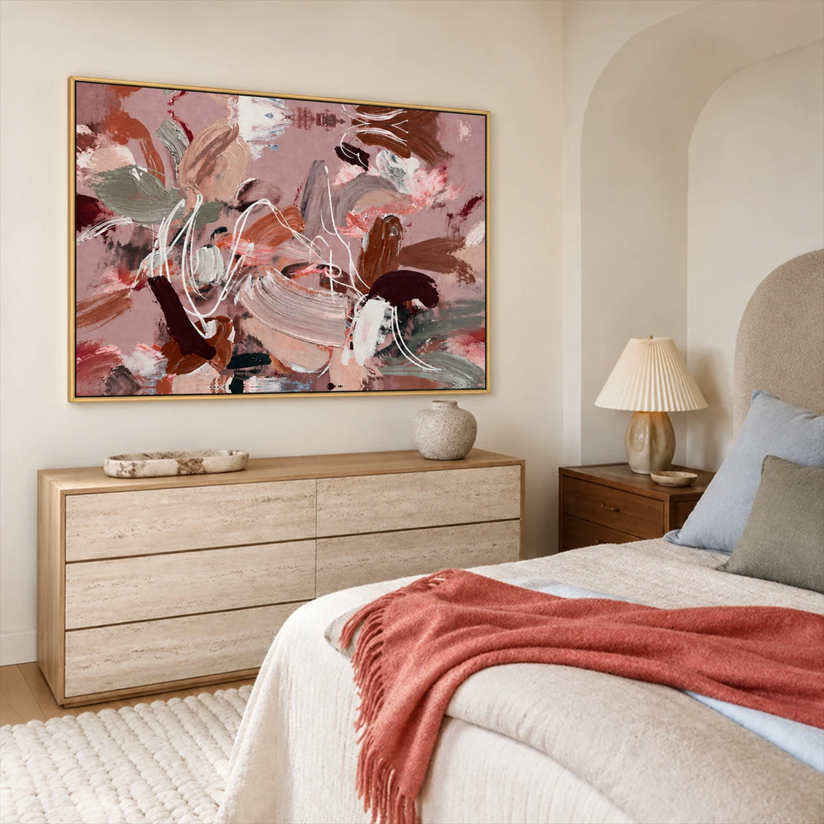 Rose Cadence artwork displayed above a wooden dresser beside a bed.