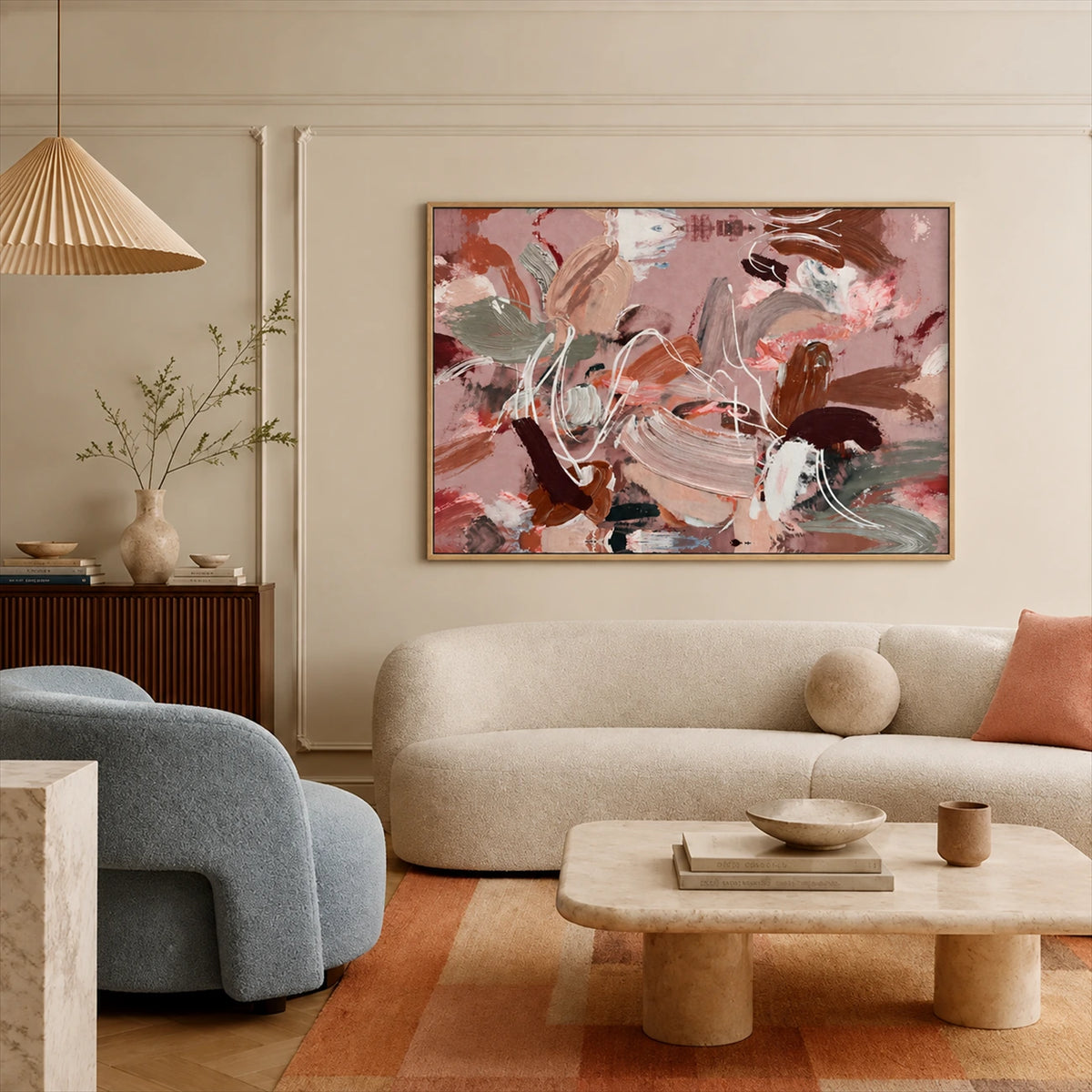 Rose Cadence artwork displayed above a cream sofa and low coffee table.