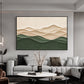 Quiet Contours artwork displayed above a gray sectional sofa.