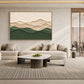 Quiet Contours artwork displayed above a cream sofa and round coffee tables.