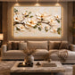 Ivory Branch artwork displayed above a pale sofa in a warmly lit interior.