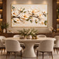 Ivory Branch artwork displayed above a dining table with upholstered chairs.