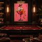 Cocktail Muse artwork displayed above a billiard table in a dark lounge.