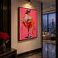 Cocktail Muse artwork displayed on a wall beside city windows.