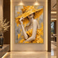 Golden Veil artwork displayed on a tall wall in a warm lobby.