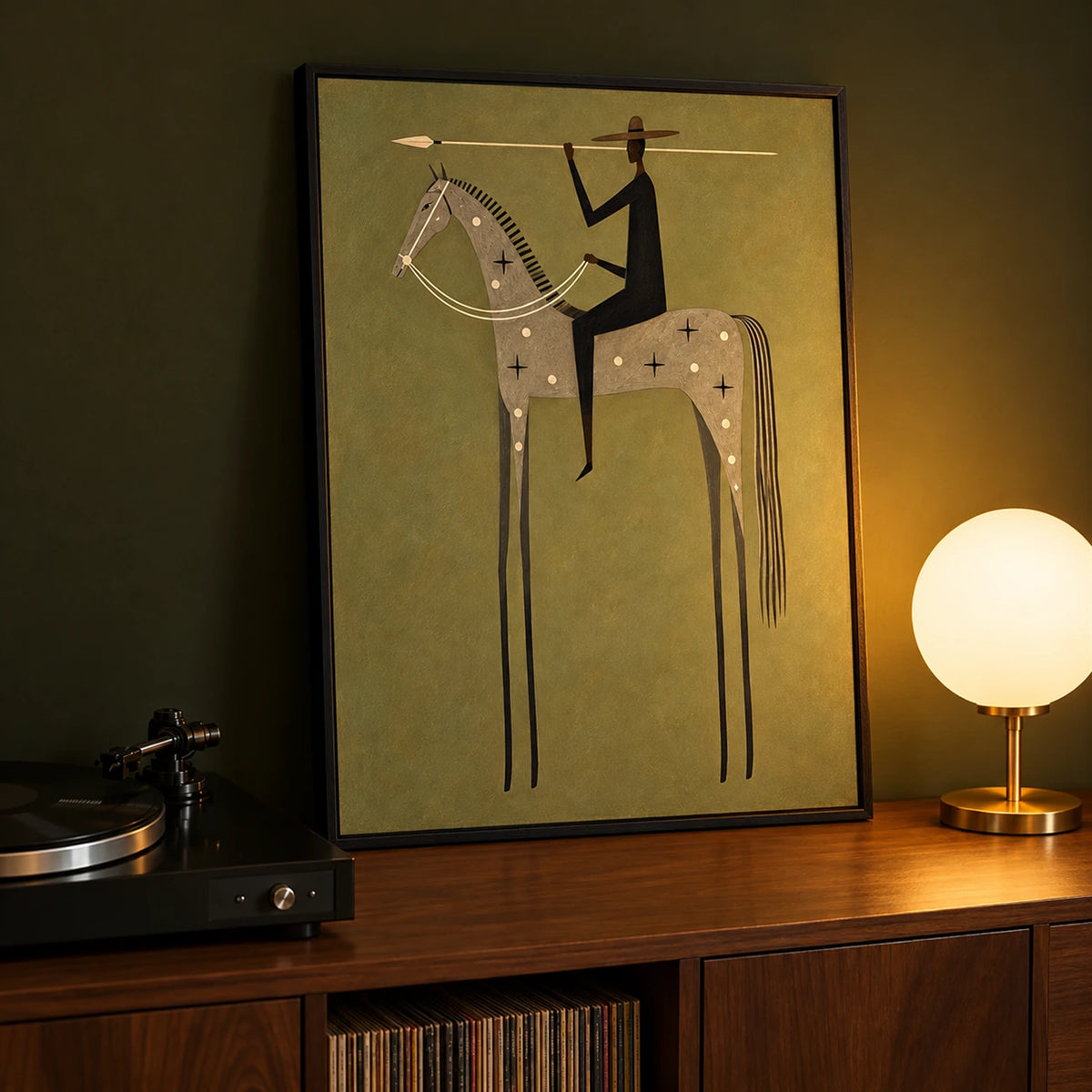 Starbound Rider artwork displayed above a record cabinet beside a glowing table lamp.