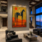 Solar Rider artwork displayed above a long console beside lounge seating.