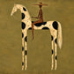 Spotted Sentinel full artwork. A slender rider sits on a cream horse patterned with bold black spots against a textured olive field.