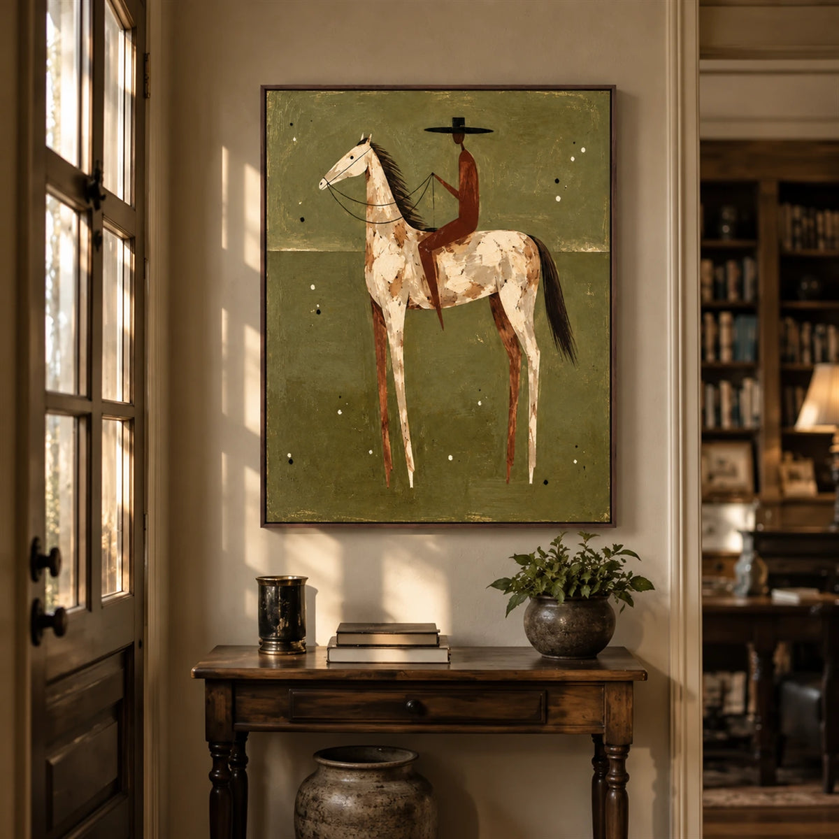 Russet Rider artwork displayed above a dark console in an arched entryway.