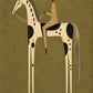 Dappled Rider full artwork. A rider in warm cream clothing sits on a pale horse with irregular black markings against an olive background.