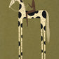 Piebald Poise full artwork. A rider in muted brown sits on a cream horse marked with large black patches.