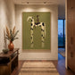 Piebald Poise artwork displayed above a console beside a tall window and flowers.