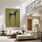 Indigo Standard artwork displayed above a console beside a dining table.