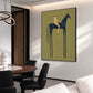 Indigo Standard artwork displayed above a desk and chair beside a bright window.