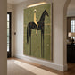 Nightfall Rider artwork displayed above a low console beside a staircase.