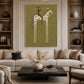 Starry Standard artwork displayed above a sofa between tall bookshelves.