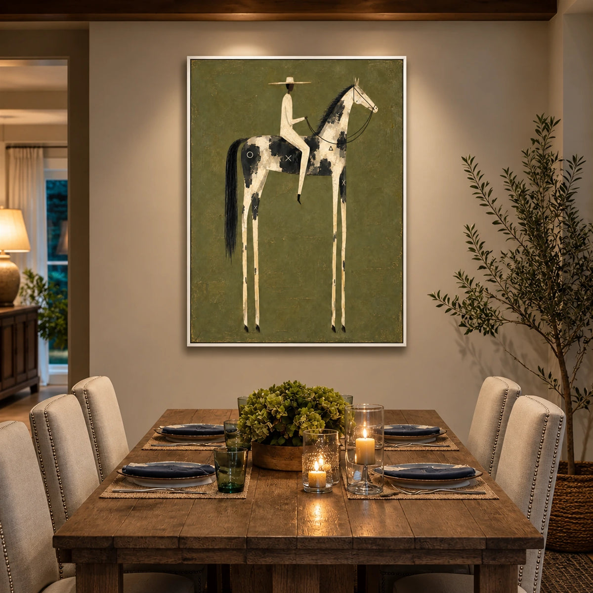 Painted Sentinel artwork displayed above a wooden console beside a dining table.
