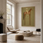 Terracotta Standard artwork displayed above low rounded seating beside tall windows.