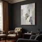 Ivory Rift artwork displayed above an armchair against a charcoal wall.