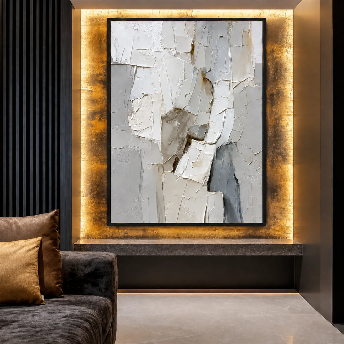 Ivory Rift artwork displayed above a dark sofa with warm accent lighting.