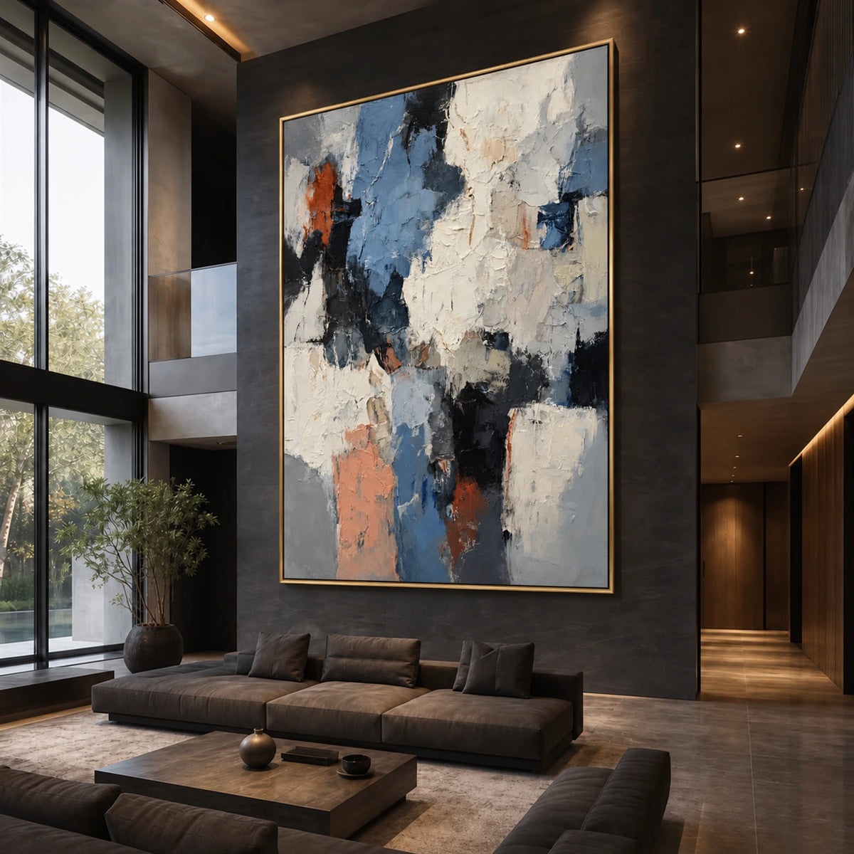 Slate Fragments artwork displayed above a sofa in a double-height living room.