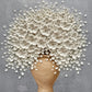 Porcelain Bouquet full artwork. A rounded bouquet of ivory petals rises from a warm earthen vase against a soft gray background.