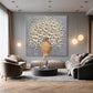 Porcelain Bouquet artwork displayed above curved seating under pendant lights.