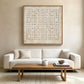 Ivory Rings artwork displayed above a white sofa and wooden coffee table.