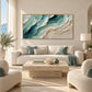Jade Shoreline artwork displayed above a cream sofa with pale green cushions.
