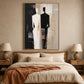 Divided Silhouette artwork displayed above a bed with rust-colored bedding.