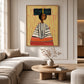Ochre Poise artwork displayed above a cream sectional in a bright lounge.