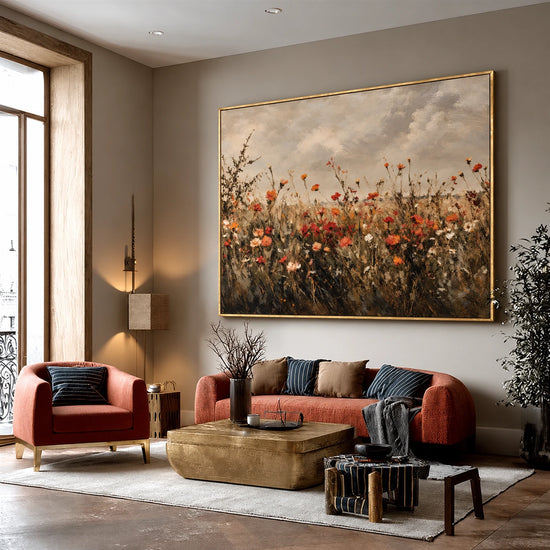 Autumn Wildflowers artwork displayed above a red sofa in a neutral living room.