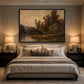 Dusklit Bank artwork displayed above a neutral bed beside table lamps.