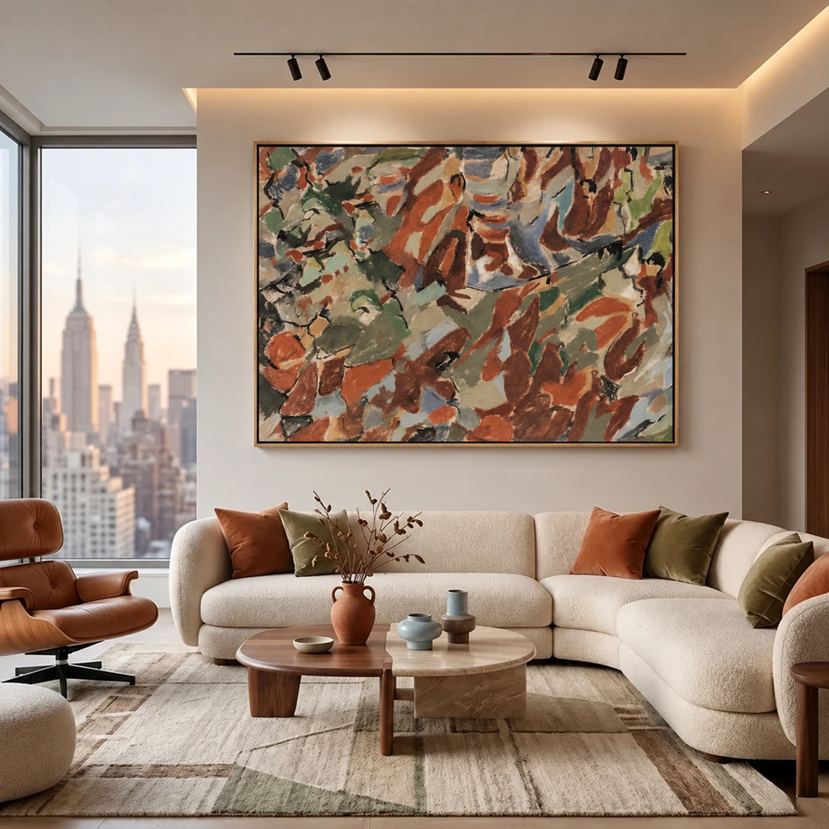 Earthen Mosaic artwork displayed above a cream sectional overlooking the city.