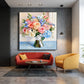 Garden Keepsake artwork displayed above a red sofa beside a mustard chair.