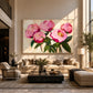 Pink Flourish artwork displayed above a sofa in a sunlit tall lounge.