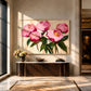 Pink Flourish artwork displayed above a console beside a tall window.
