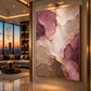 Mauve Faultlines artwork displayed on an illuminated wall beside a lounge.
