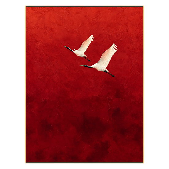 Crimson Flight Wall Art with two white cranes on a crimson background, shown in a slim gold frame on a transparent background.