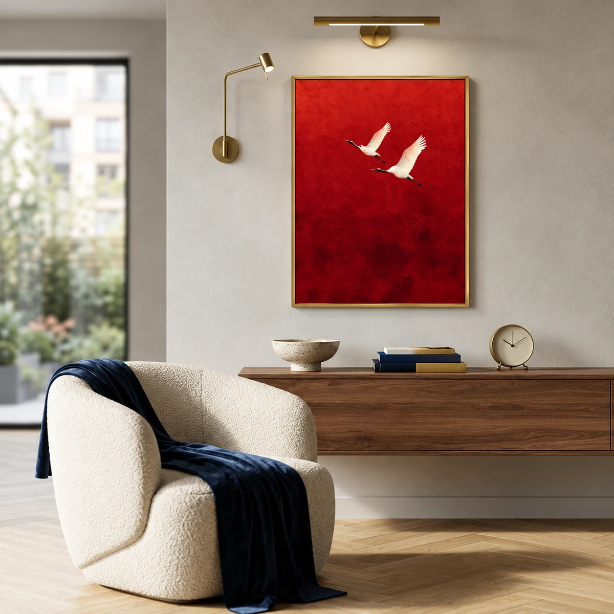 Crimson Flight artwork displayed above a console beside a cream armchair.