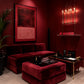 Burgundy Fields artwork displayed above burgundy lounge seating against a red wall.