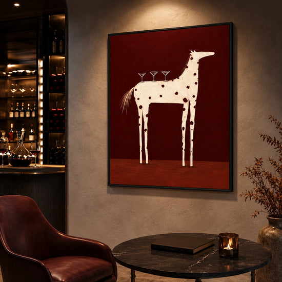 Cocktail Steed Wall Art displayed beside a burgundy lounge chair and cocktail table in a moody bar interior.