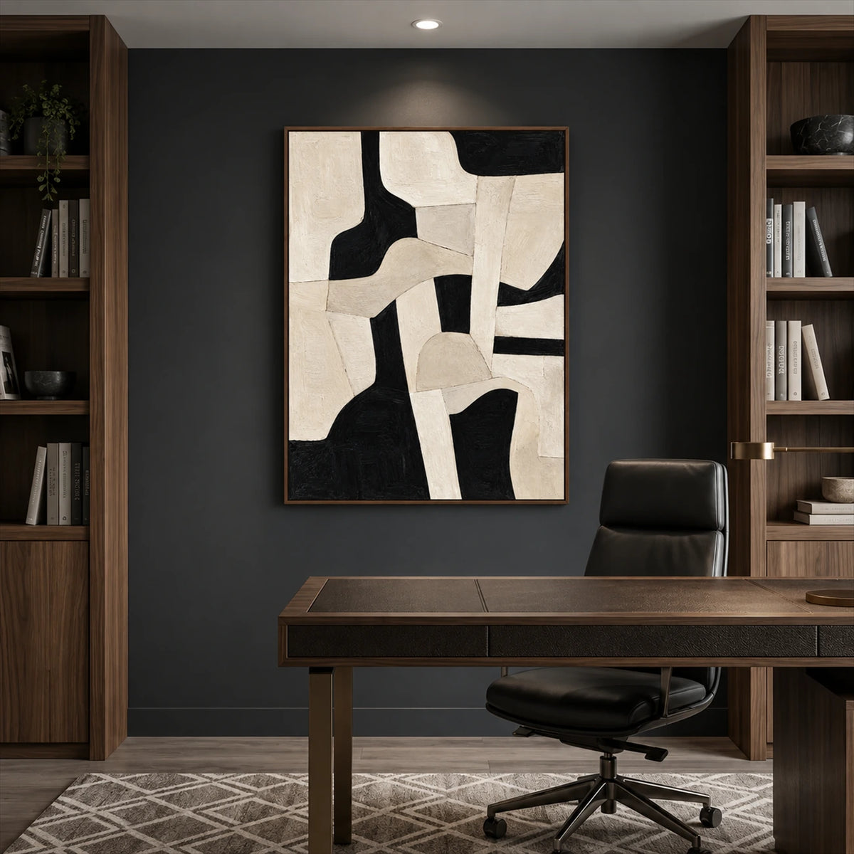 Ivory Interlock artwork displayed above a desk between bookshelves.