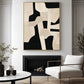 Ivory Interlock artwork displayed above a fireplace in a bright living room.