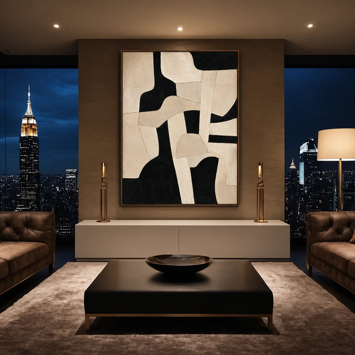 Ivory Interlock artwork displayed above a low cabinet in an evening city-view room.