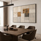 Ochre Masonry artwork displayed above a dark dining table.