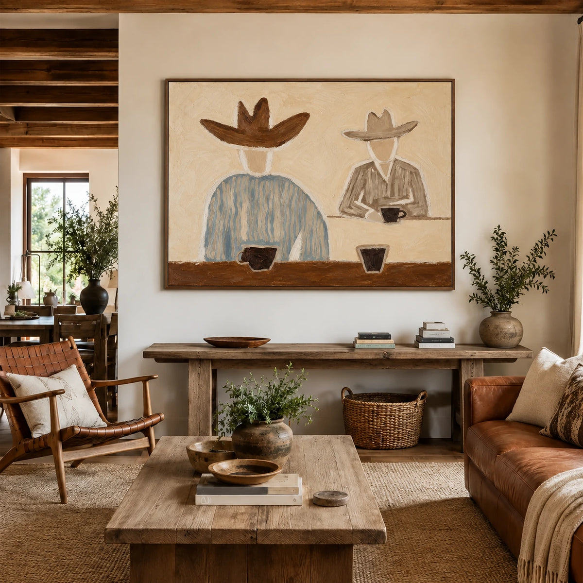 Saddlebreak Coffee artwork displayed above a console in a rustic living room.